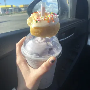 white cake donut with sprinkles and a yummy taro frappe!
