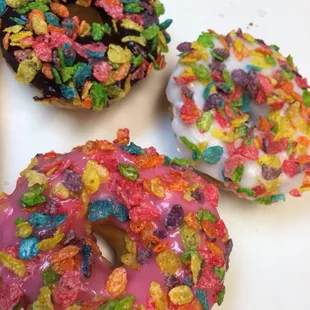 three different flavored donuts