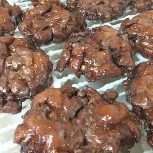 chocolate donuts on a cooling rack