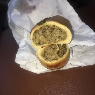 Boudin kolache. It's great. Soft buttery bread stuffed in this rice dressing. It's like a Golden Corral's roll stuffed. Sweet and savory!