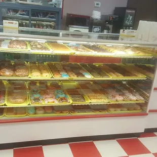 a display of donuts in a bakery
