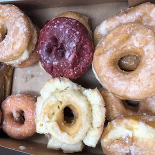 a variety of donuts in a box