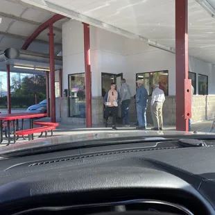 Folks anxious to enjoy the tasty treats at Donut Palace...