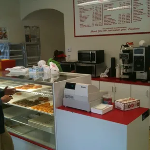 a man standing in front of the counter