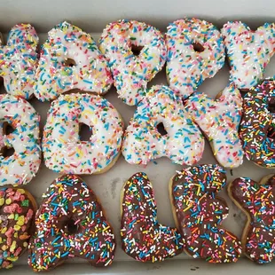 a dozen donuts in a box