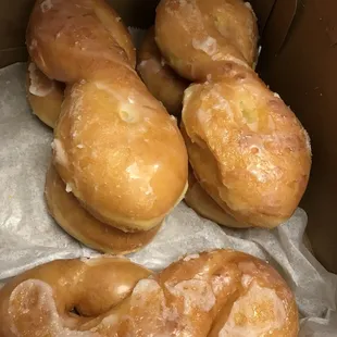 six glazed donuts in a box