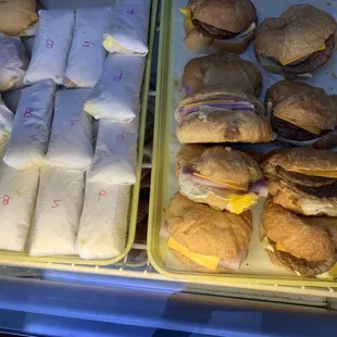 a display of sandwiches and rolls