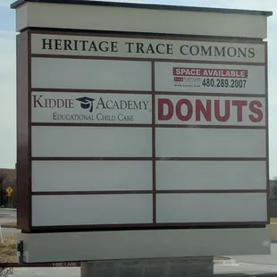 a sign for a donut shop