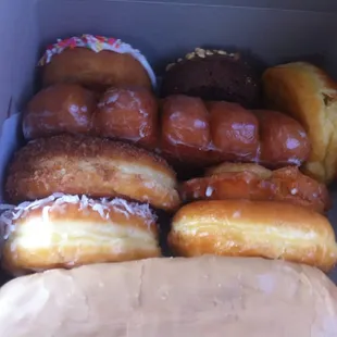a variety of donuts in a box