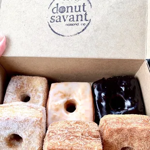 a variety of donuts in a box
