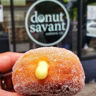 Jane dough- raised dough w/ vanilla pastry cream filling and sugar dusting