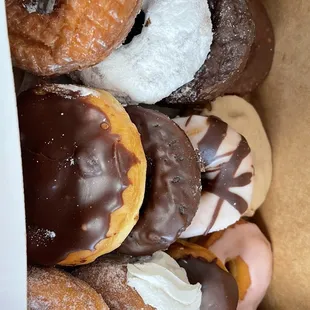 a variety of donuts in a box