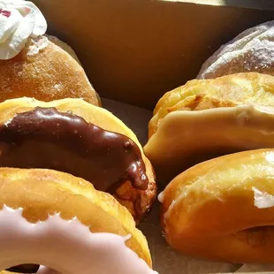 Strawberry cream, chocolate bavarian cream, strawberry frosted, bavarian cream, maple glazed and glazed...yum!