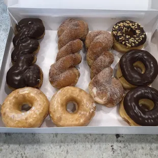 a variety of donuts in a box