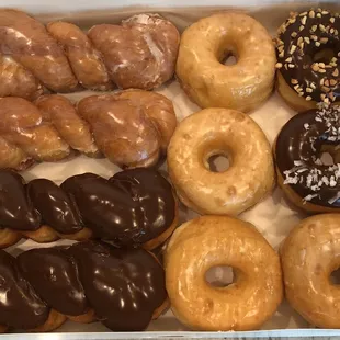 a variety of doughnuts in a box