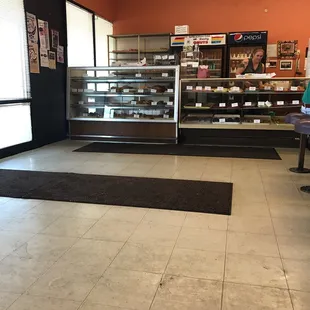 Counter area of delicious freshly made donuts.
