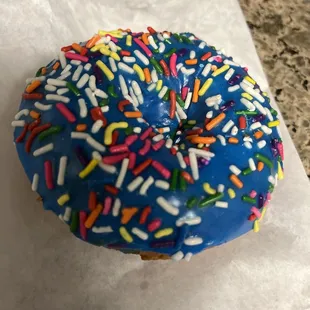 Blue flavor donut for the little one! They have an orange cream frosting and strawberry! Yummm