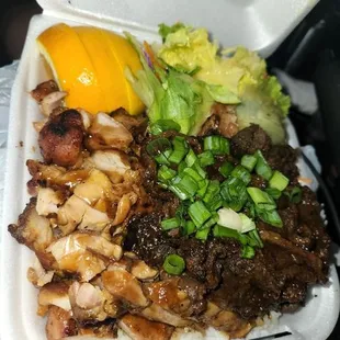 Chicken/terriakki plate w/ steam rice,salad &amp; an orange