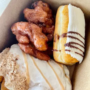 a variety of donuts in a box
