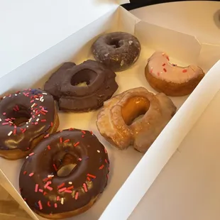 a variety of donuts in a box