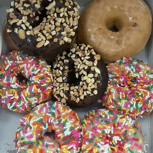 Sprinkle donuts! So moist and fresh! Chocolate is rich and moist and the famous Glaze donut! It melts in your mouth !