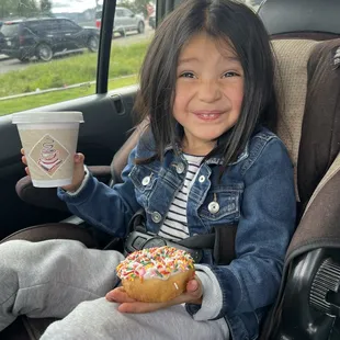 Sprinkle donut and a Kids size (small Hot chocolate) around 4-5$ total.