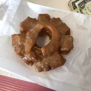 a donut on a piece of wax paper