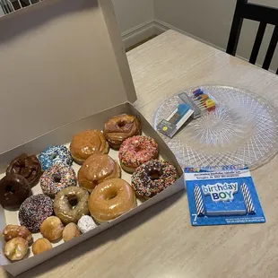 I picked up a dozen donuts &amp; a few donut holes and made a Donut Cake for my grandson's birthday.  It was fun &amp; delicious!