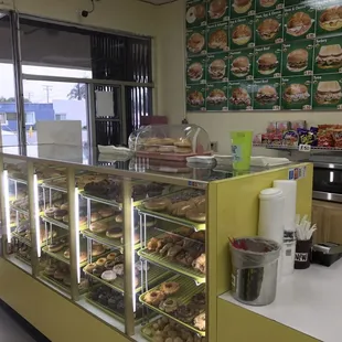 a display case with a variety of donuts