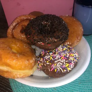 a variety of donuts on a plate