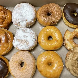 a variety of doughnuts in a box