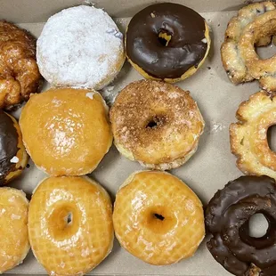 a variety of donuts in a box