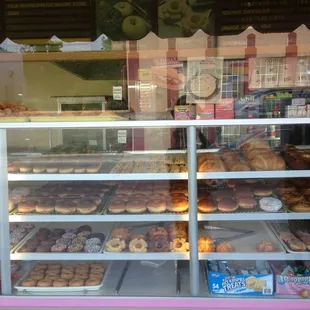 a display of various types of donuts