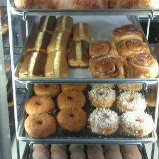 Jalapeno croissant, cinnamon rolls, glazed crumb donuts, glazed coconut donuts