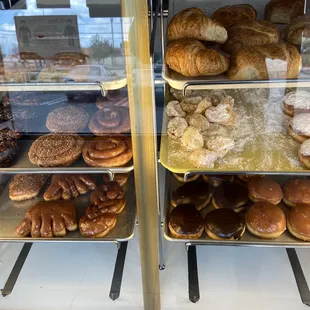 a display of various types of donuts
