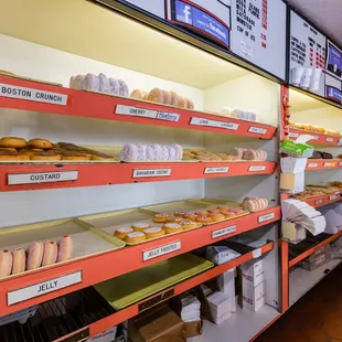 shelves of donuts and pastries
