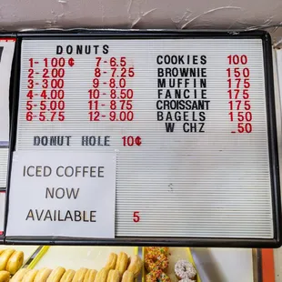 a menu for donuts at a donut shop
