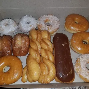a variety of doughnuts in a box