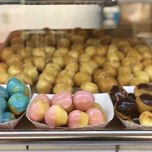 a variety of doughnuts on display