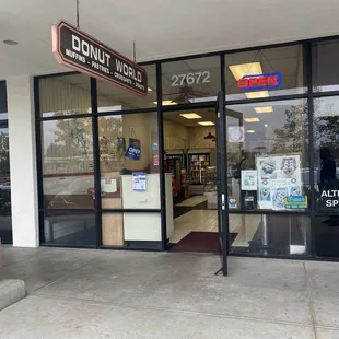 the entrance to a donut shop