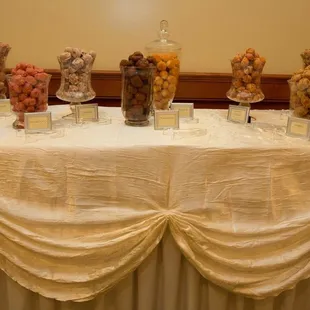 Donut Bar at our wedding with 8 flavors of the yummiest donut holes ever!