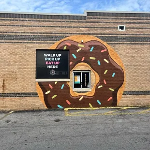 A festive and colorful donut drive-thru!