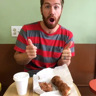 He had already scarfed one by the time I took the pic!