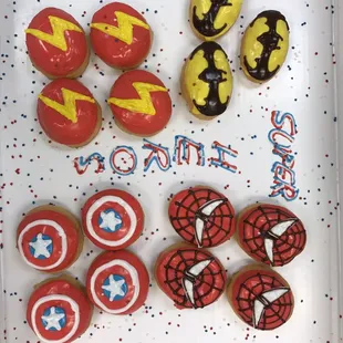 captain america, iron man, and spider - man cookies