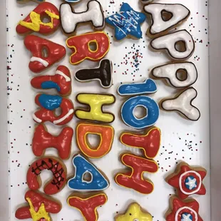 a box of decorated cookies