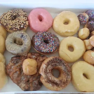 a variety of donuts in a box