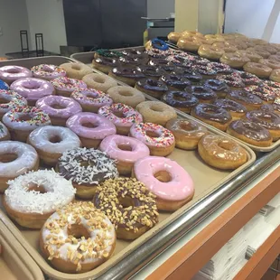 a variety of doughnuts on display
