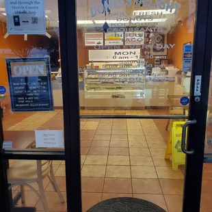 the front door of a donut shop