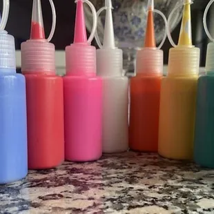 We love COLOR! We can paint on almost anything. Canvas, glass, porch leaners, ornaments, wood etc...