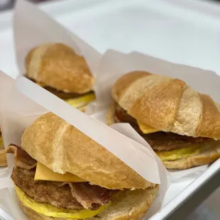 two sandwiches in a styrofoam container